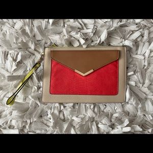 Call it Spring Clutch with strap. Never been used!